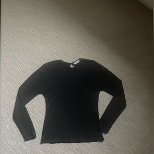 No seam sleeves with back hook closing. Perfect condition.